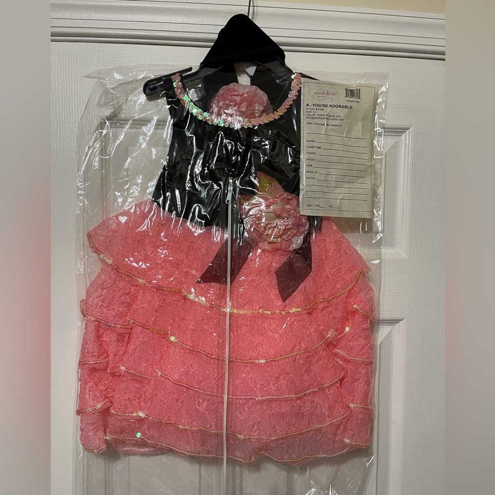I HAVE 10Revolution Dancewear Dress with Matching Headband Size XS.